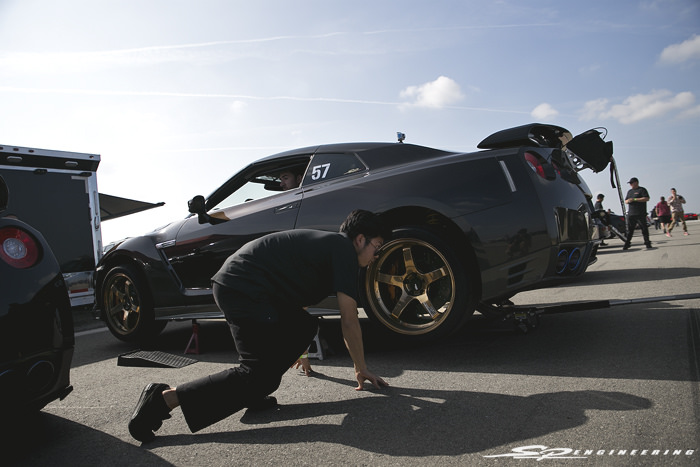 Apparently when you're in a rush to get a car up on jack stands, you unintentionally form yourself into a sprinter position while getting back up. Coincidentally, this guy did hurdles and what not back in high school. Lol!