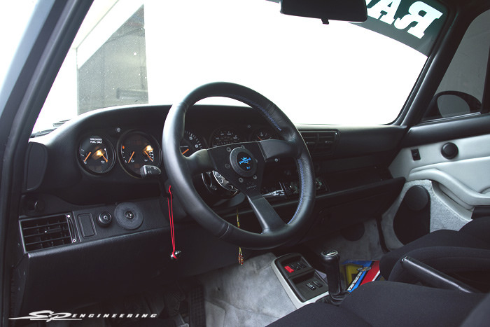 The simplicity of Porsche's flat dash is great as well. Especially when paired with a Personal wheel and bucket seats.