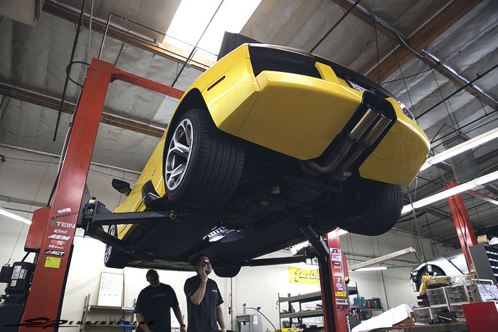 As raw as the factory calipers are, Allan wanted to paint match his calipers with his car. And lucky for him, his rotors still had some life left in it to be turned.