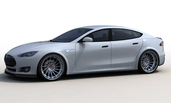 One of the leading brands in minuscule aftermarket automotive exterior/interior parts has brought a little more life to the Tesla Model S’. With the help of RevoZport’s design and R&D team, your Tesla Model S can now mean something more than just a fast electric car. RevoZport’s vision was to focus on giving the Model S more downforce and a wider track-width to compliment the cars performance for better handling and grip. “RevoZport realize the importance of grip and focused in improving the Model S downforce and track-width. An overall 40mm wider track allows the car to sit on 9.5J with 255 tires at the front and 11J with 295 tires at the rear. Front splitter, side skirt, trunk spoiler and rear diffuser are carefully designed to provide high downforce and thus create a well-balanced performance vehicle that ho fast in both straights line and corners. Each product is designed using CAD software with the highest precision and revered engineered to fit the OEM components.”