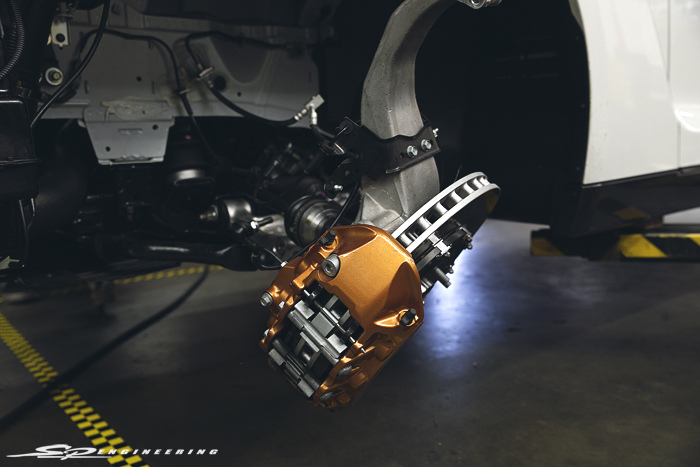 Very rare to see a brake caliper with zero brake dust. These calipers will never look this pretty again.
