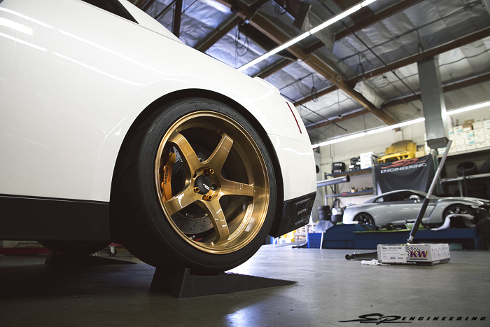 Don’t mind the 3 lug nuts. The techs were setting ride height.