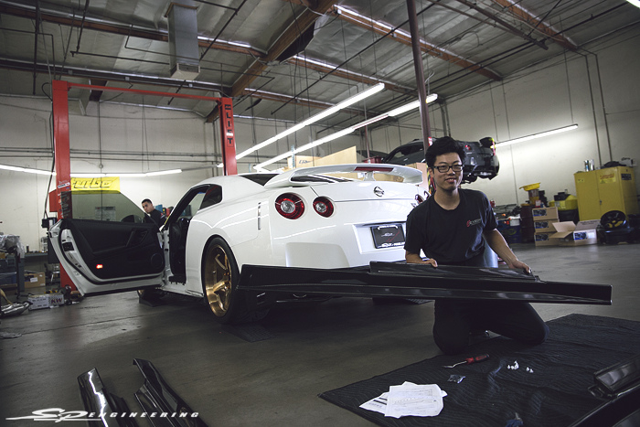 This guy seemed happy to install the Zele side skirts.