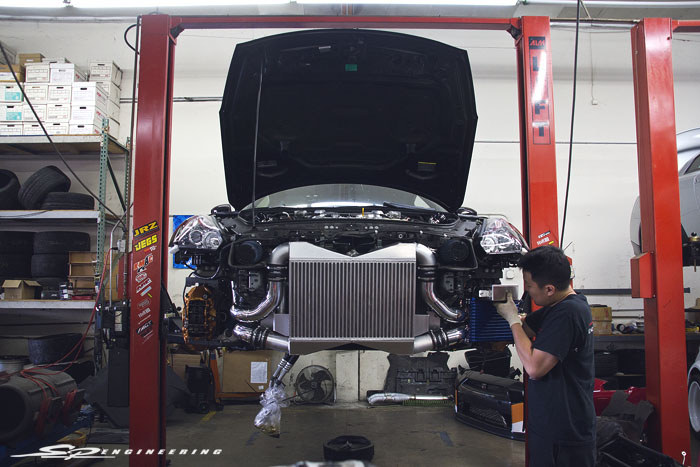 The intercooler system gets upgraded to our race intercooler with polished aluminum piping and Tial BOV’s.
