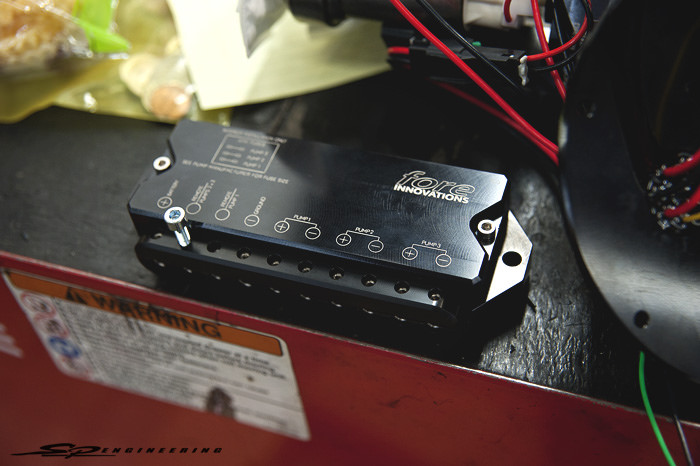 This was our first time working with a Fore Innovations product. This one in particular is the triple fuel pump module and supports up to 1600+ AWHP. For those on the fence about it, we recommend it. Supports over 1600 all wheel horsepower E85 and race fuel compatible (see pump manufacturer recommendations on fuel compatibility) Requires aftermarket fuel feed and return lines Retains OEM level sender, temperature sensor, and transfer function O-ring pump seal eliminates in-tank fuel hose to completely eliminate failures in E85 and race gas applications High current hermetic wire seal completely eliminates the possibility of fuel smells and leaks 12 gauge power wires ensure maximum pump performance Polymer pump support minimizes pump noise and eliminates electrolysis Transfers without restrictor orifice on return discharge, ensuring accurate fuel pressure under any output or consumption conditions