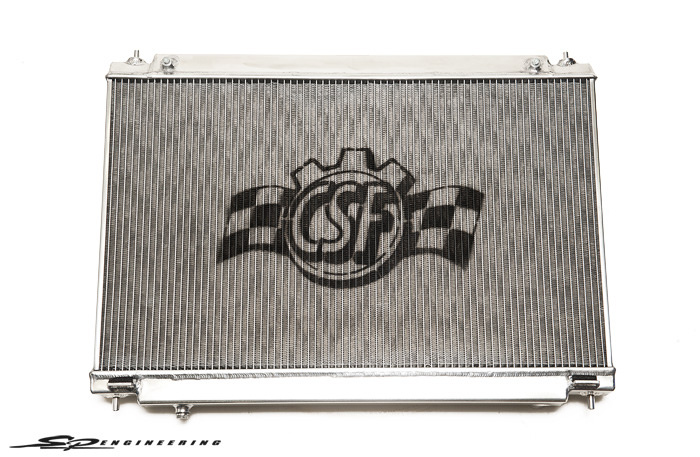 CSF Radiators recently approached us with their newly released Nissan GT-R radiator. What makes this radiator special compared to others out on the market is that it’s the worlds largest capacity drop in dual row core radiator that does not require any modifications to the body of the vehicle. It is rated for over 1000HP; Great for all the crazies making their way up to that power level. “B-Tube” technology – Unlike a regular oval shape type radiator tube, CSF uses a specially engineered tue in a shape of a “B”. These “B-Tubes” are carefully formed and then brazed over the seam to seal. CSF is able to use thinner and lighter aluminum material (better cooling efficiency) because this design is actually stronger than normal oval shape tubes that are welded. The design (inlet in the middle of tube that is seam brazed) increases the heat transfer surface area of the tube by approximately 15% over regular tubes. You get the efficiency of 2 smaller tubes vs. 1 large tube within the same space criteria. With “B-tubes” you are able to get “dual liquid laminar flow.” The tubes are made from aircraft grade special clad aluminum and are intricately formed on our high precision 6-stage tubeforming mill. No other aftermarket radiator manufacturer uses this technology. This technology raises the bar and sets the standard for high performance radiator cores. CSF Radiators for your 09+ Nissan GT-R is available to purchase through us for $475.00 + tax. info@sp-power.com / 626-333-5398