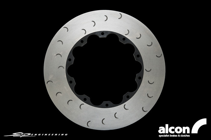 Alcon has developed a range of rotor options for the R35 GT-R that far surpass the performance and durability of the stock brakes, at an affordable price. These rotor kits offer a wide range of options that work seamlessly with the OE calipers. These Alcon rotors are made from the same unique iron alloy and undergo the same manufacturing processes as all Alcon race rotors, providing superior dimensional stability and resistance to thermal stress. Alcon’s crescent grooves continuously refresh the brake pad surface and prevent gas build up from the pads. Exceptional levels of initial bite and feel are achieved without the inherent cracking issues associated with drilled rotors.
