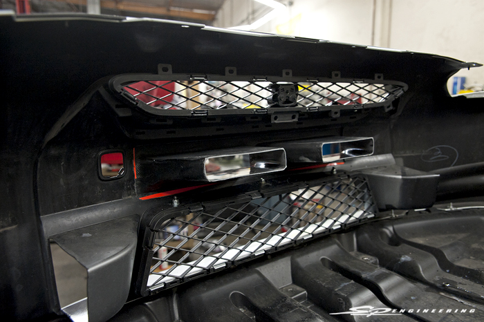 TiTek recently released their new carbon fiber bumper duct . The duct is perfect for those who seek a new look without having to purchase a whole new aftermarket bumper. Made with high quality vacuumed infused carbon, this bumper duct fits on point and retains the factory tow hook hole location. Besides adding an aggressive touch to the front end, the main function of this duct is to guide cool air into the intercooler for maximum performance.