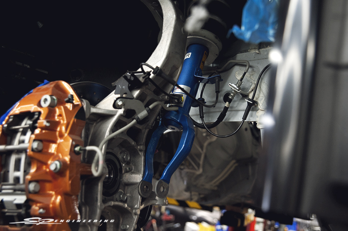 You can tell you have a Track-Tuned suspension not only by the labels, but by the color. It’s difficult to see in the photo, but it’s actually a lighter baby blue color compared to the normal Base, Premium and Black Edition model.