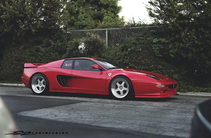 This rare Hamann widebody Ferrari F512M is a one of a kind lady in red. Classy, yet, ratchet at wide open throttle. A little back story on the car itself; She’s a 1995 Ferrari F512M. The last version of the Testarossa. There were 500 total produced, 75 of them which were RHD. This particular one you see in front of you is 1 of 2 in red that was converted to the Hamann widebody. And mind you, the only one in the states. But let’s not get carried away with that.