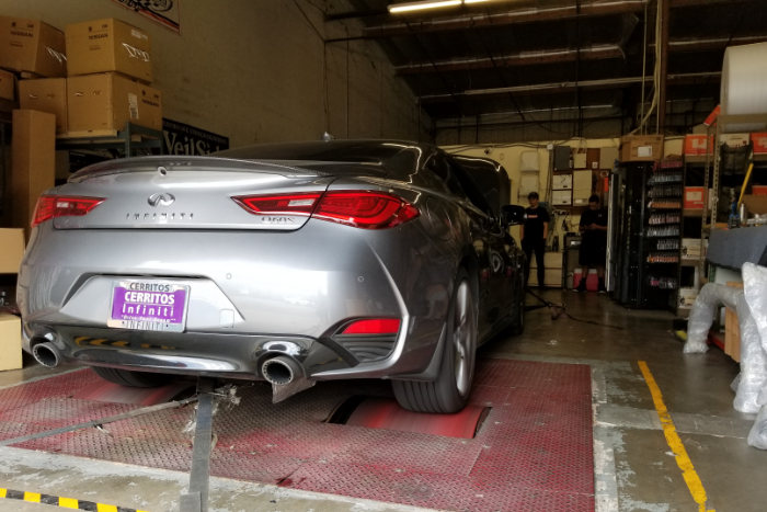 You know someone loves their car when there's dealer plates still on it and they're looking to start some modifications! 