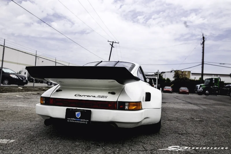 I believe this rear spoiler is larger than your average whale's tail. 