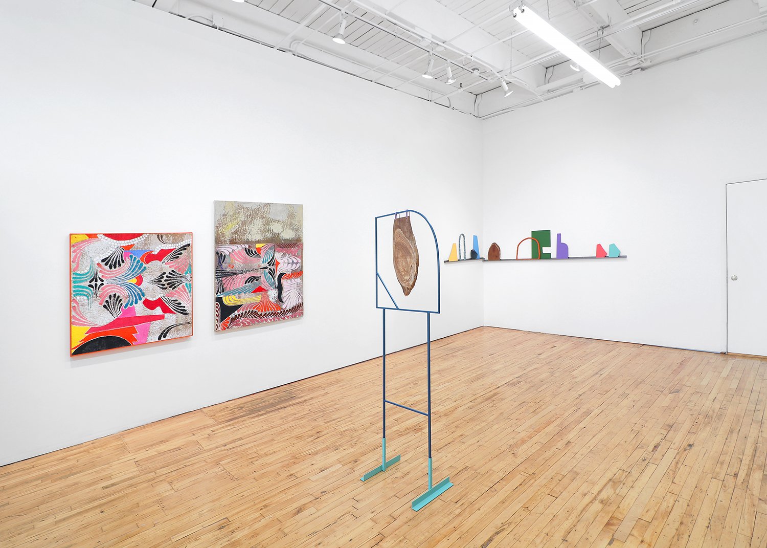  Installation shot of  Cosmic Fishing  at Devening Projects (paintings on left, Guzzo Pinc) 