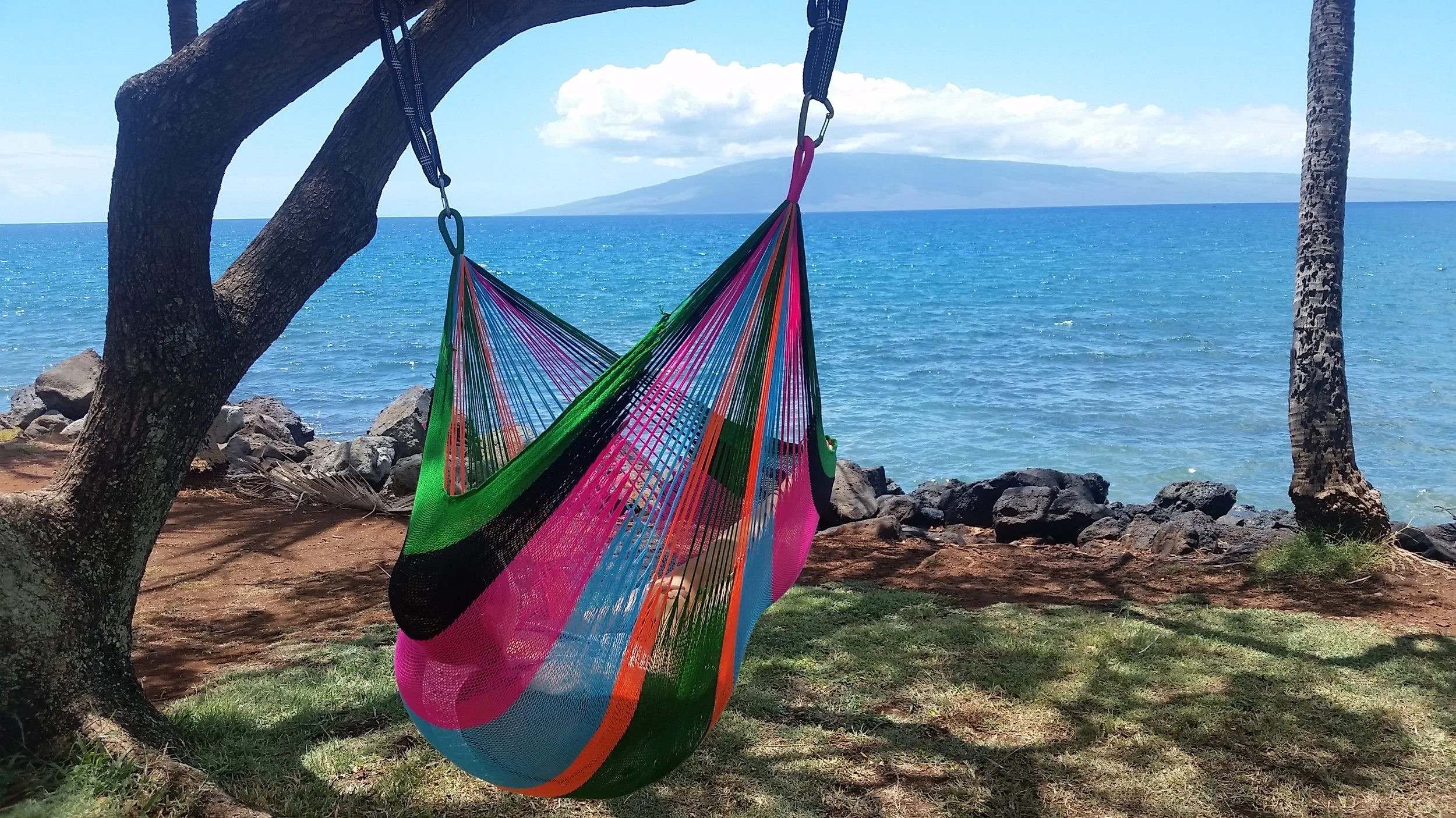 (Contact us for colors available as they change daily) Referred to as the "Sitting Hammock" in size, this hammock is extra comfy for 1 person with a weight support of 300+ lb. Sit down or extend out into a full laying position. Ultra soft, hand woven triple acrylic hammocks can be left outdoors without worry of them losing color or shape. The Thai Sitting Hammock weaving process takes up to 2 weeks to create. This weatherproof hammock is ideal for any outdoor area, great for the beach or lounging by the pool. Luxuriously soft and comfortable. Come rain or shine, you can leave it outdoors and the colors stay bright for many years. The Thai Sitting hammock is available in many unique designs and colors not seen in any other hammocks in the world. We label them after our favorite beach spots on Maui, a perfect place to enjoy them.