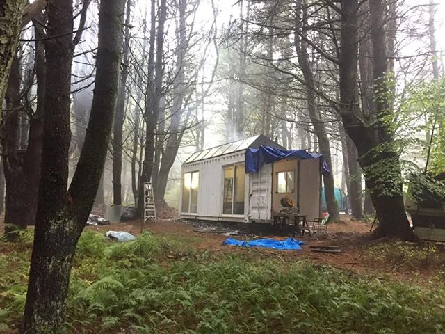 #Contanium #Sawtooth #cabin finds a new home in the woods near the #Woodstock festival site #container #prefab #eco #offgrid