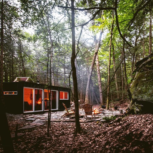 When I&rsquo;m in the #woods I&rsquo;d rather be outdoors, but our #container #cabin guarantees dry, comfortable shelter year round. #ecofriendly #offgrid #cabinporn #saugerties #cabinlife #dwell