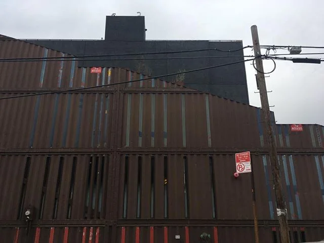 Admirable container design in Brooklyn- a 4-story building that cleverly cut slices into the sides as windows and decor. Should we do a Brooklyn model?