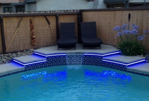 LED lighting around a pool can be soothing and whimsical.