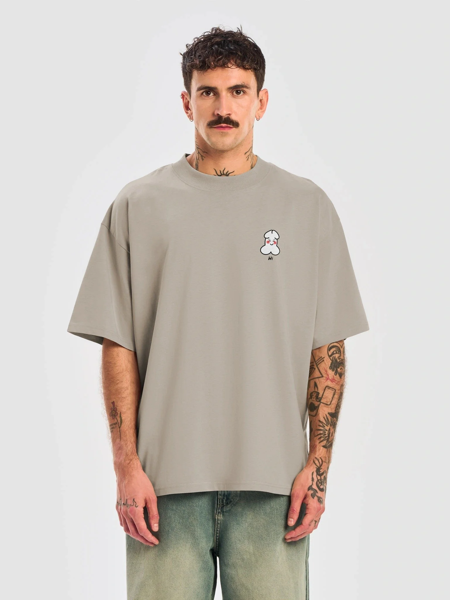 Junior Unhinged Main Character Oversized Organic Heavyweight T-shirt in stone by Oliver Henggeler.