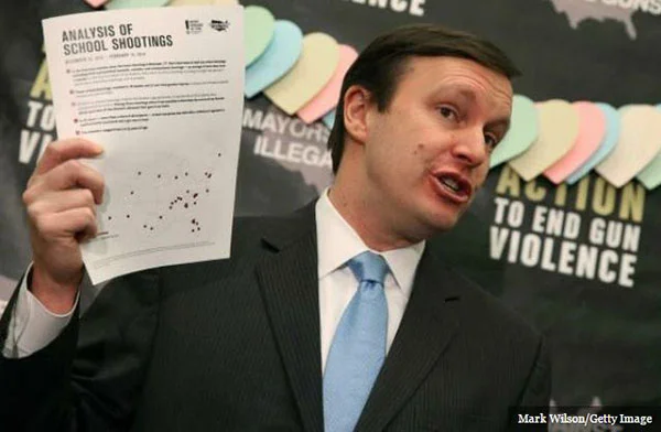 Senator Chris Murphy speaking about gun violence statistics.
