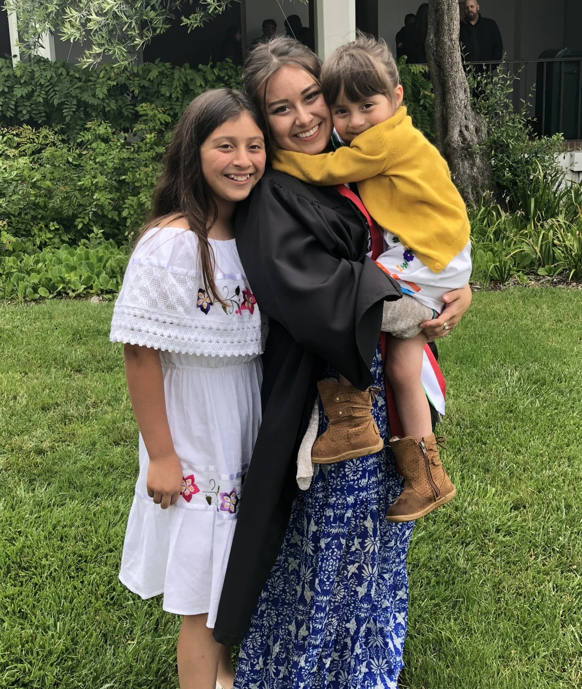 Kiara, middle, with her siblings. 
