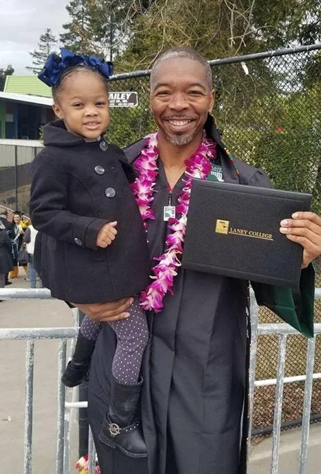 Greg with niece on his graduation day achieving his goal of higher education!