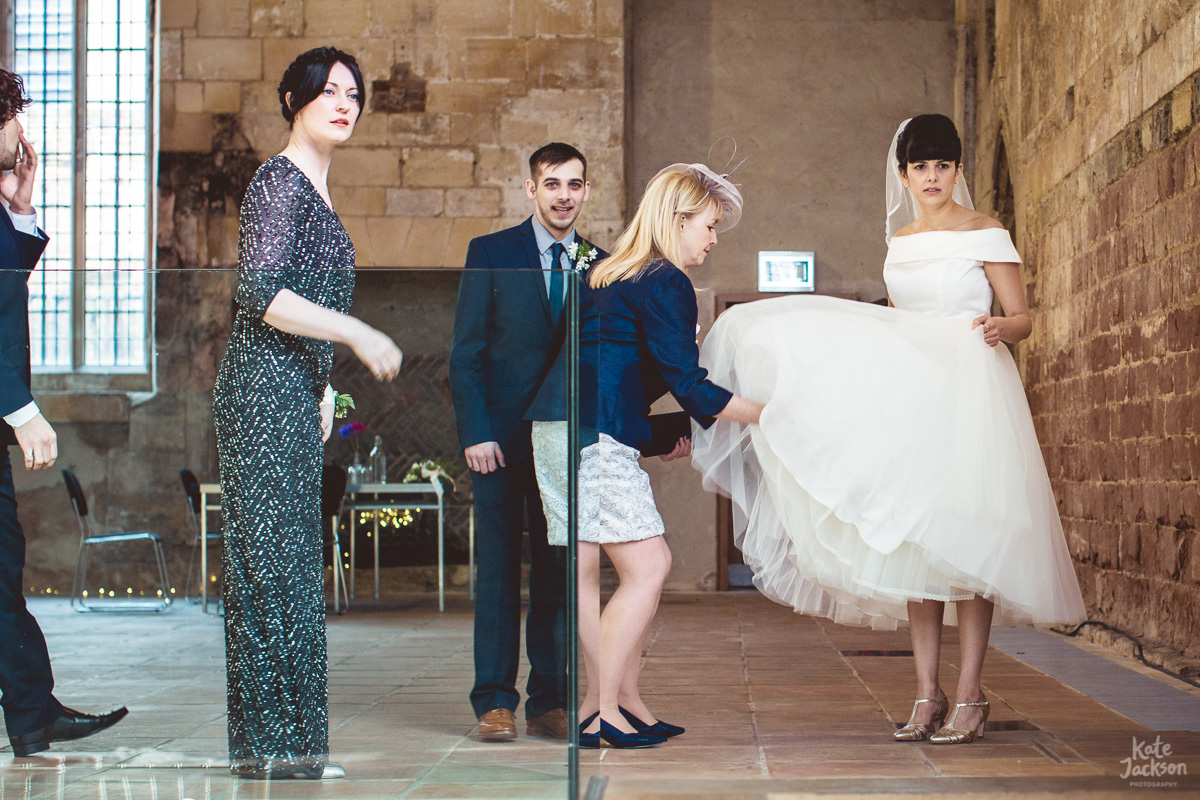 Boho bride about to say I do at Spring Wedding at Blackfriars Priory Gloucester