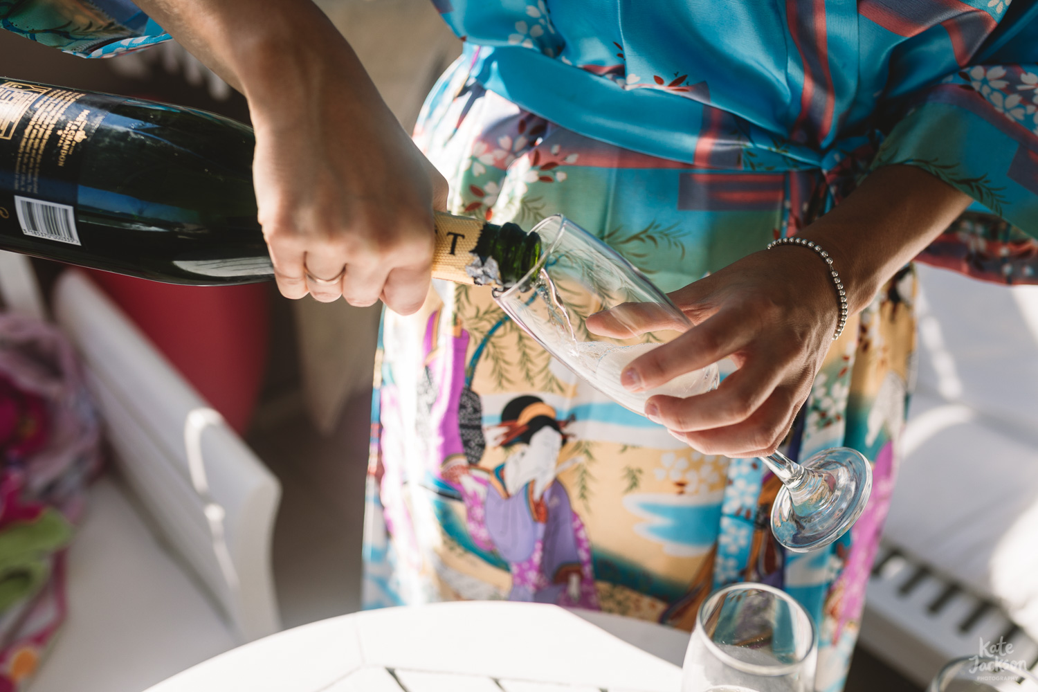 Fun Champagne at Beach Destination Wedding in Skiathos Greece - Kassandra Bay Resorts | Kate Jackson Photography