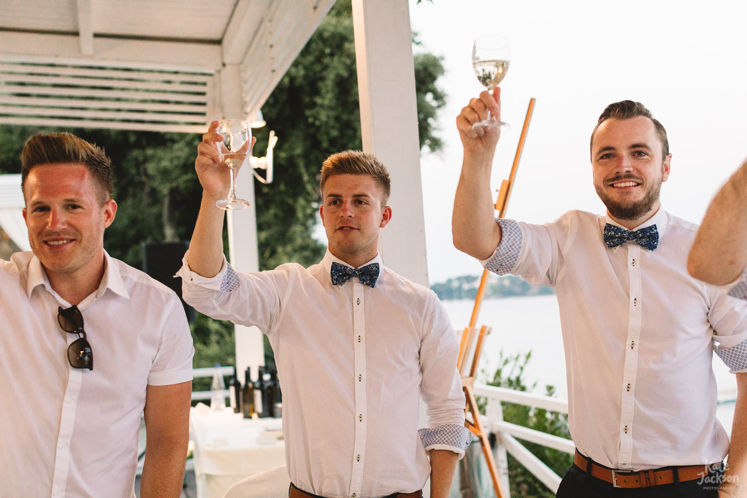 Groomsmen at relaxed beach wedding at Kassandra Bay Resorts