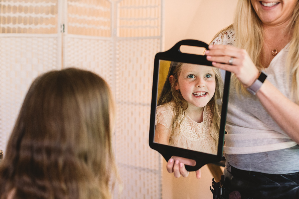 Flower Girl Getting Ready at Relaxed Wedding