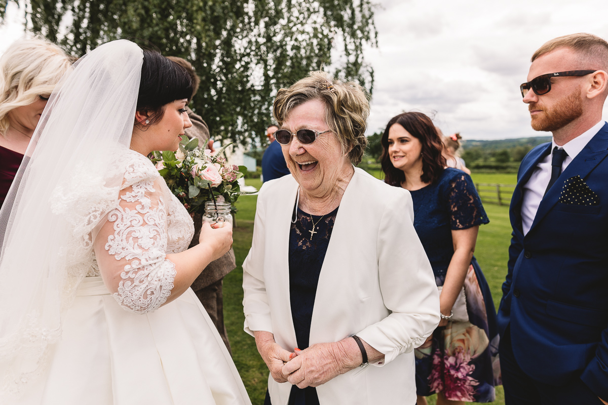 Fun Grandmother laughing at bride | DIY Hyde Barn Weddings