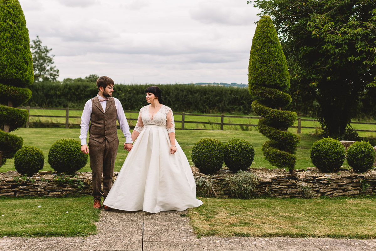 Outdoor wedding photography with bride in a vintage style berketex bridal dress