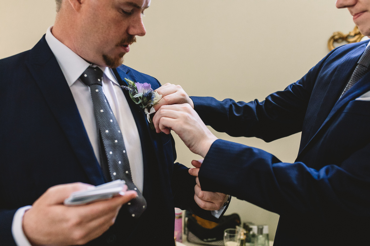 Rustic purple buttonholes at destination wedding france