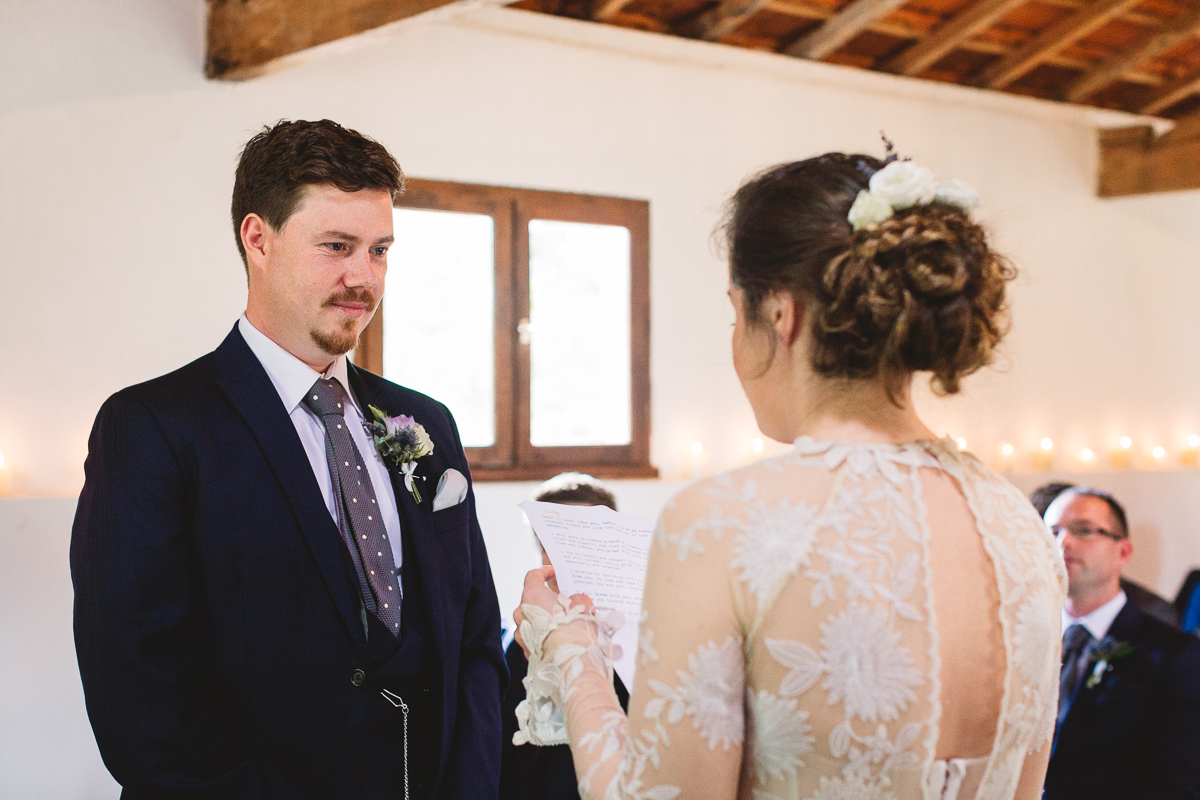 Personalised vows at humanist wedding in french barn