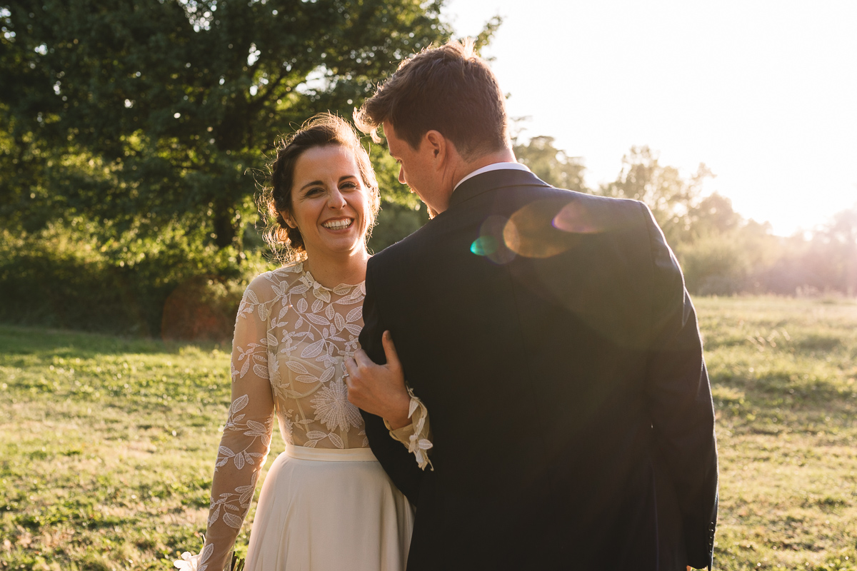 Happy couple at rustic chateau wedding
