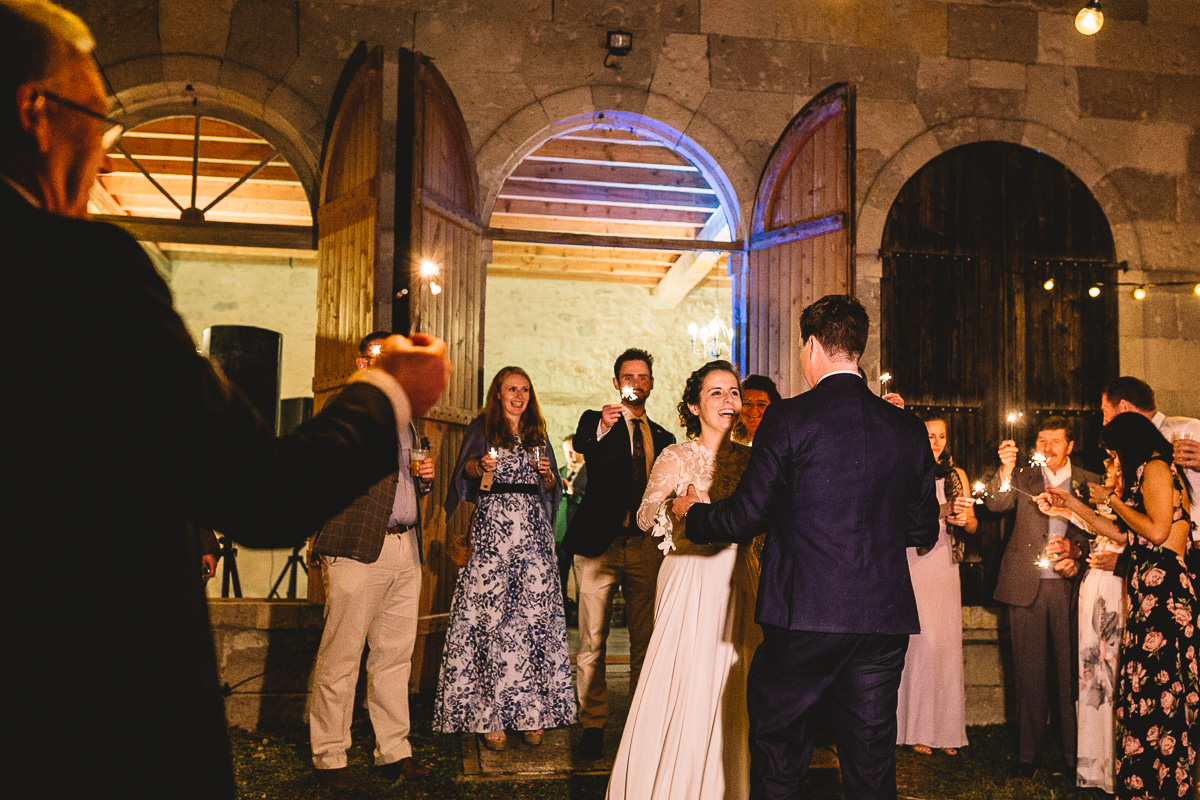 Outdoor wedding in France with a bride in a Rue De Seine dress