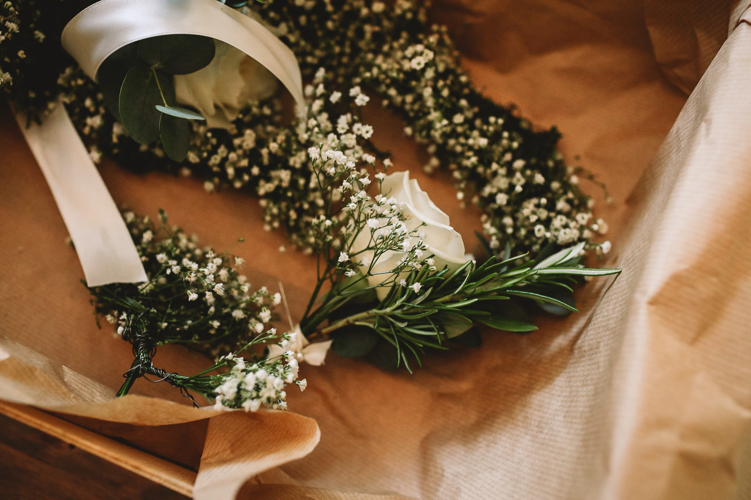 Simple white buttonholes from Moss and Clover Kelham in Sheffield