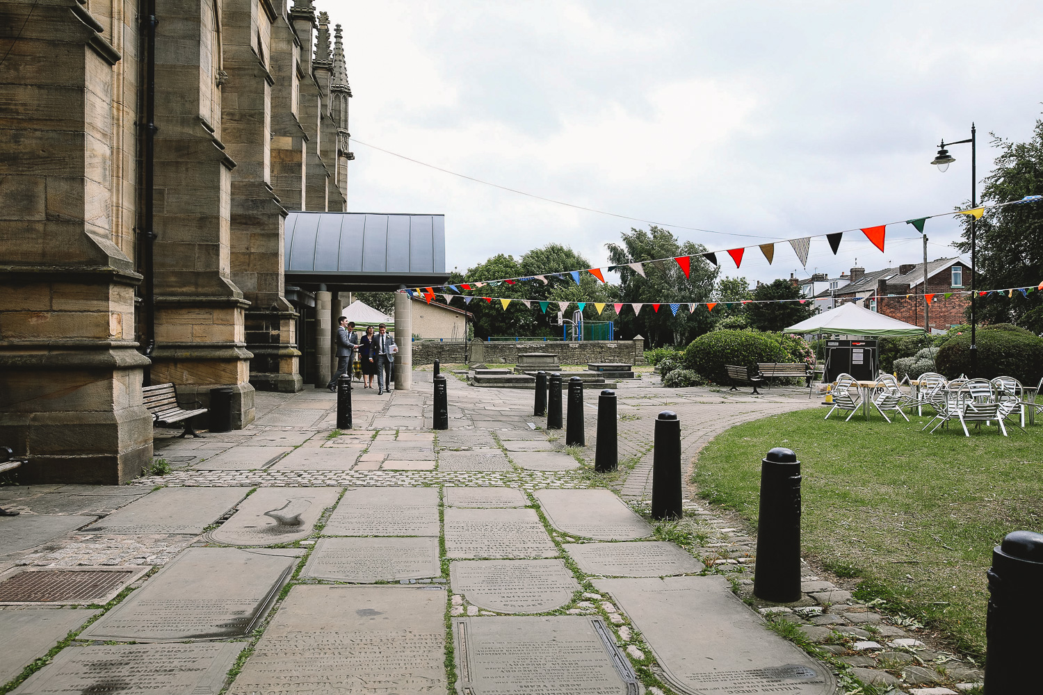 Exterior of St Marys Church in Sheffield with fun colourful bunting hanging outside