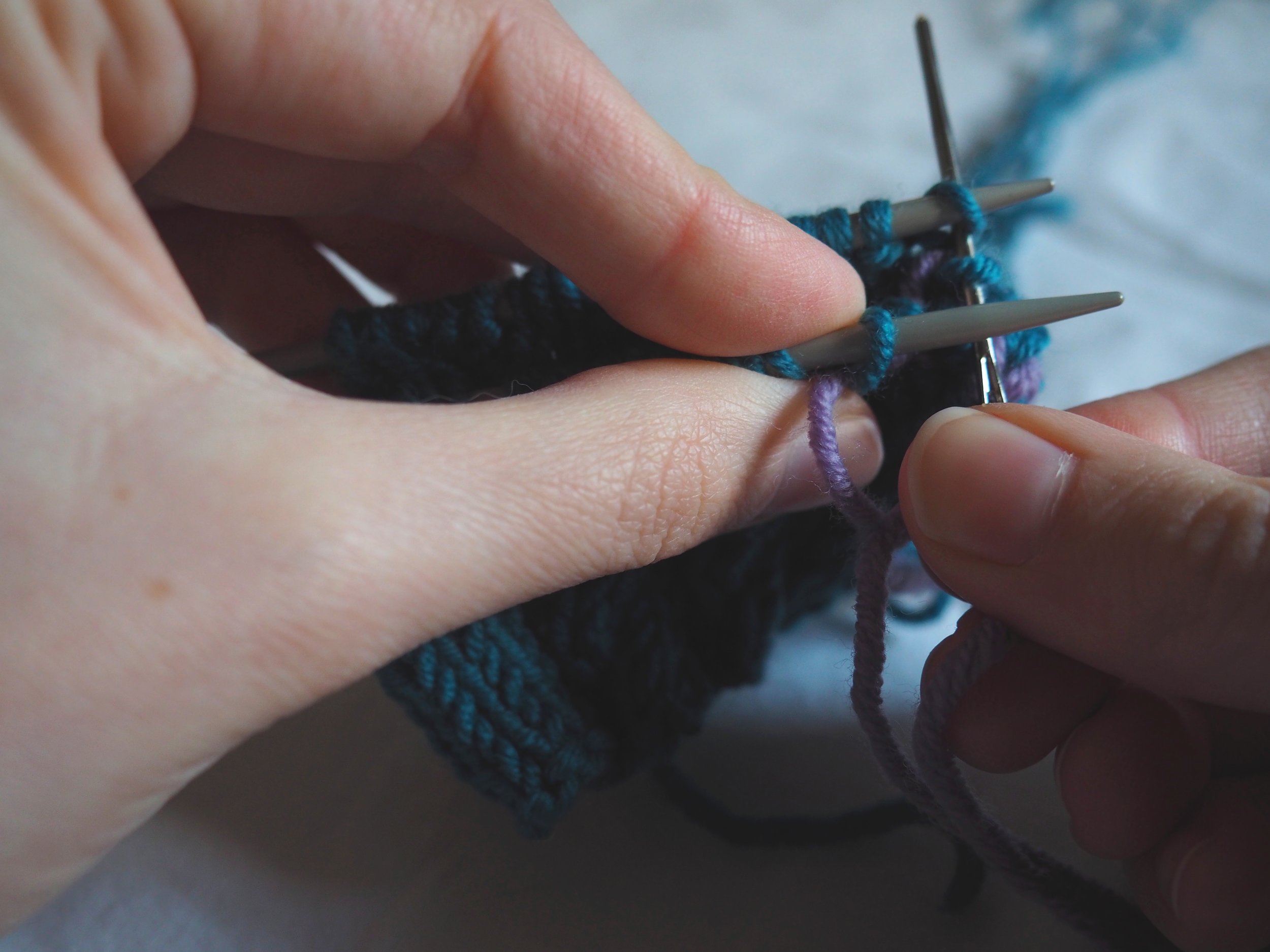 thread the yarn knitwise into the 2nd stitch.