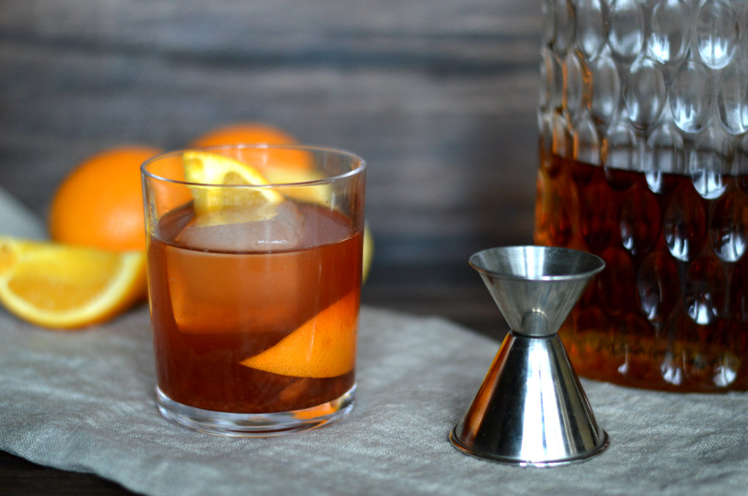 The Old Fashioned Cocktail Made with Bourbon, Orange, and Simple Syrup | CaretoPair.com