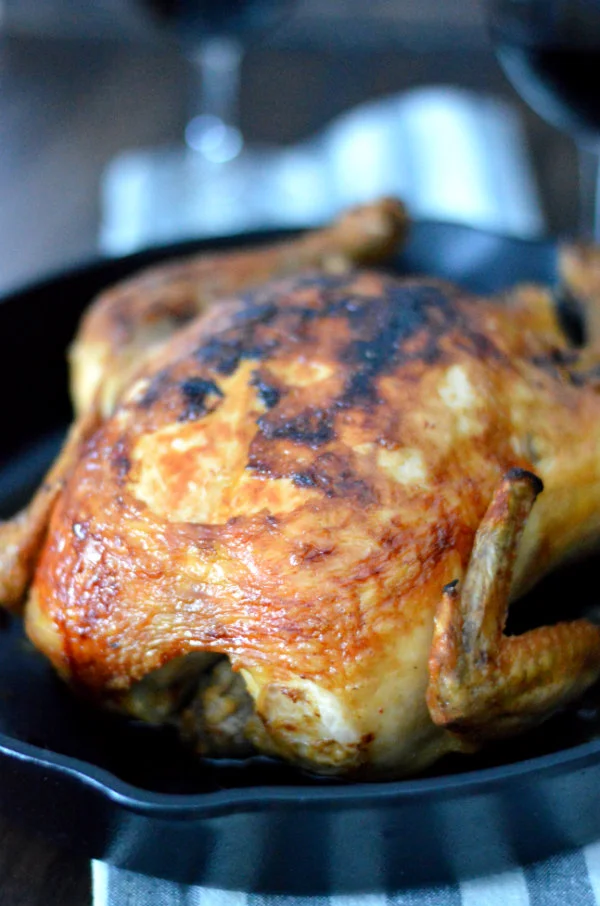 Roasted Chicken is one of the easiest meals to make, honest! I don't know why people waste their money on overpriced rotisserie chickens when you can get much more meat with your money on a raw one