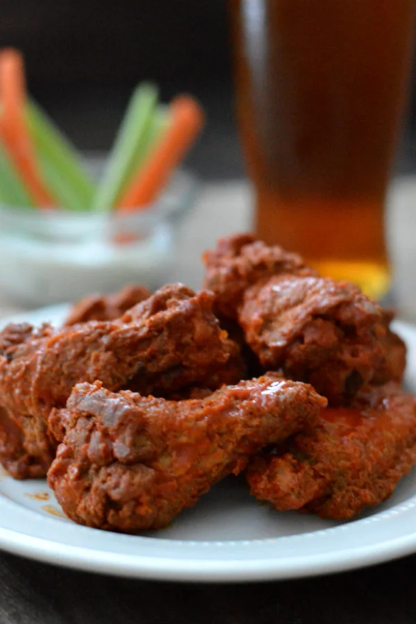 Here's a list of the best beers to pair with chicken wings! It may be an easy pairing, but some beers accentuate flavors more than others! via CaretoPair.com