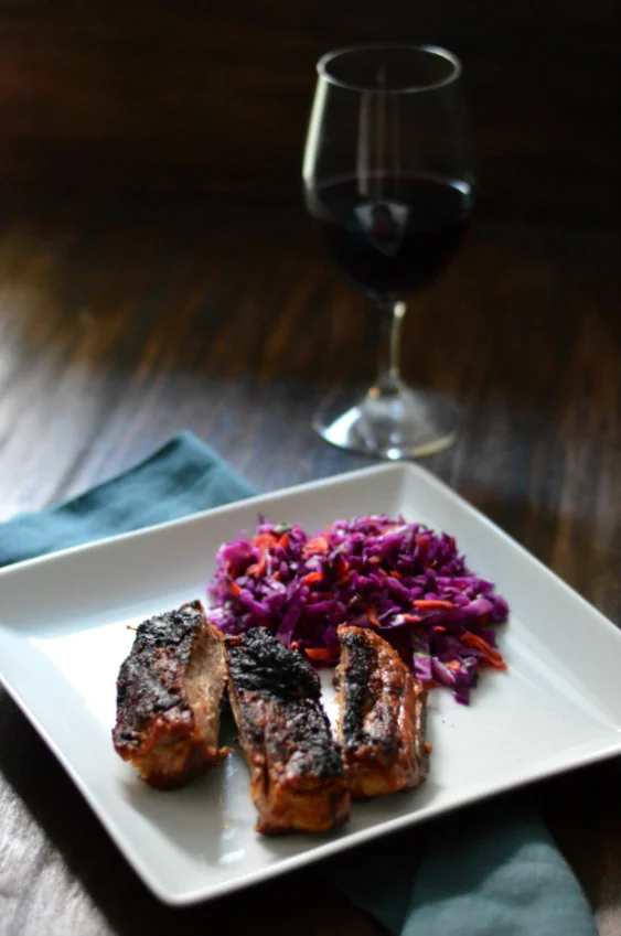 Lots of red wines pair perfectly with grilled ribs. Try Zinfandel, Syrah, or even Cabernet Sauvignon. Visit CaretoPair to find out more!