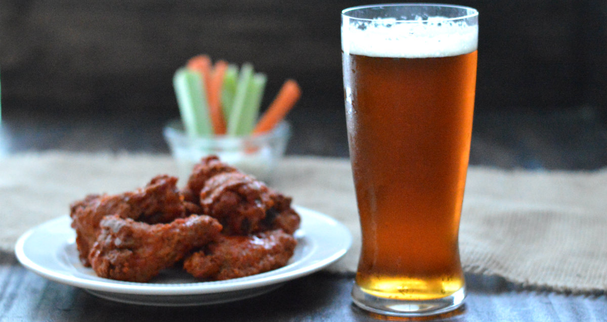 The best list of beers to pair with chicken wings, whether you want them to heat things up or cool things down | CaretoPair.com