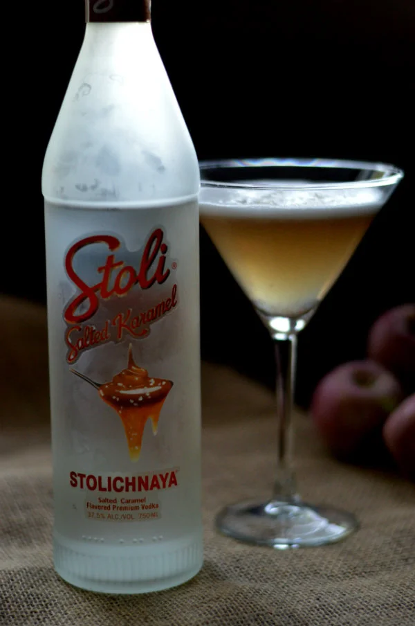 The Salted Caramel Apple Flip Cocktail using Stoli salted caramel vodka, simple syrup, and an egg white. One of the best cocktails for fall! CaretoPair.com