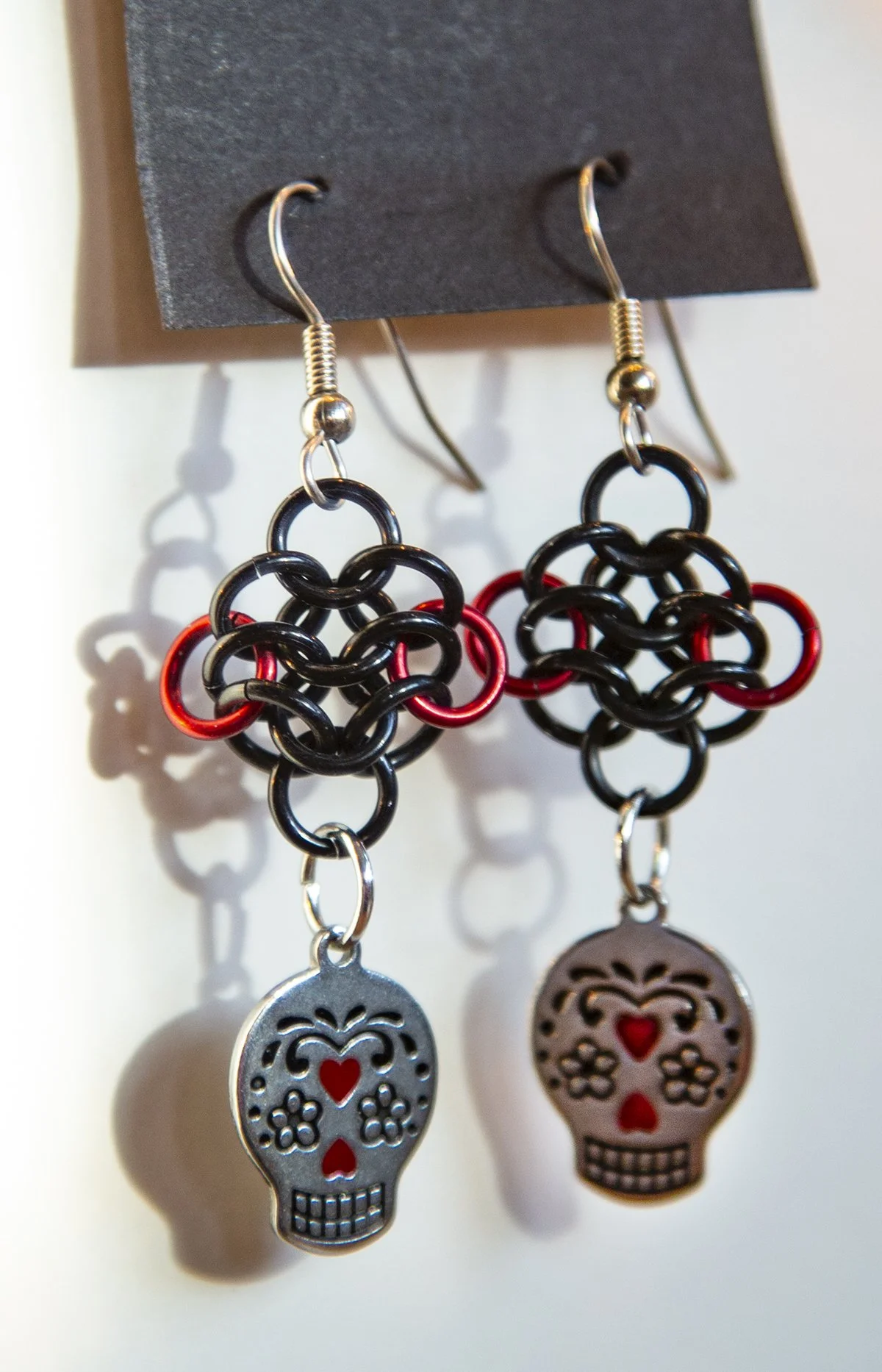 jewelry black and red chain mail sugar skull earrings.jpg