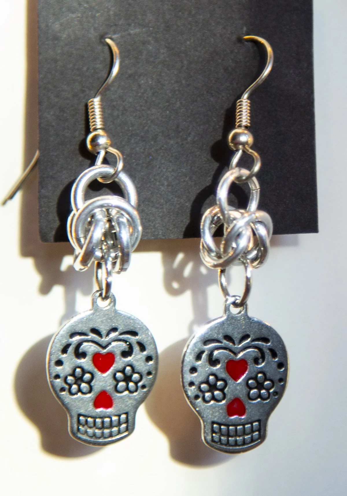 jewelry silver chain mail sugar skull earrings.jpg