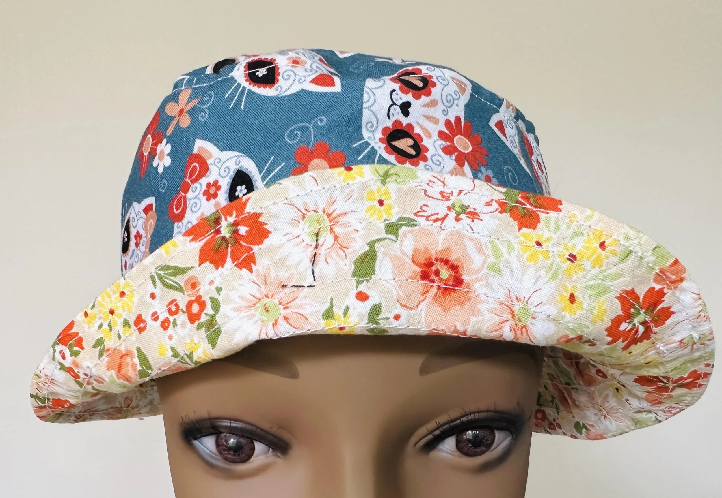 cat skull with bow and floral bucket hat.jpg