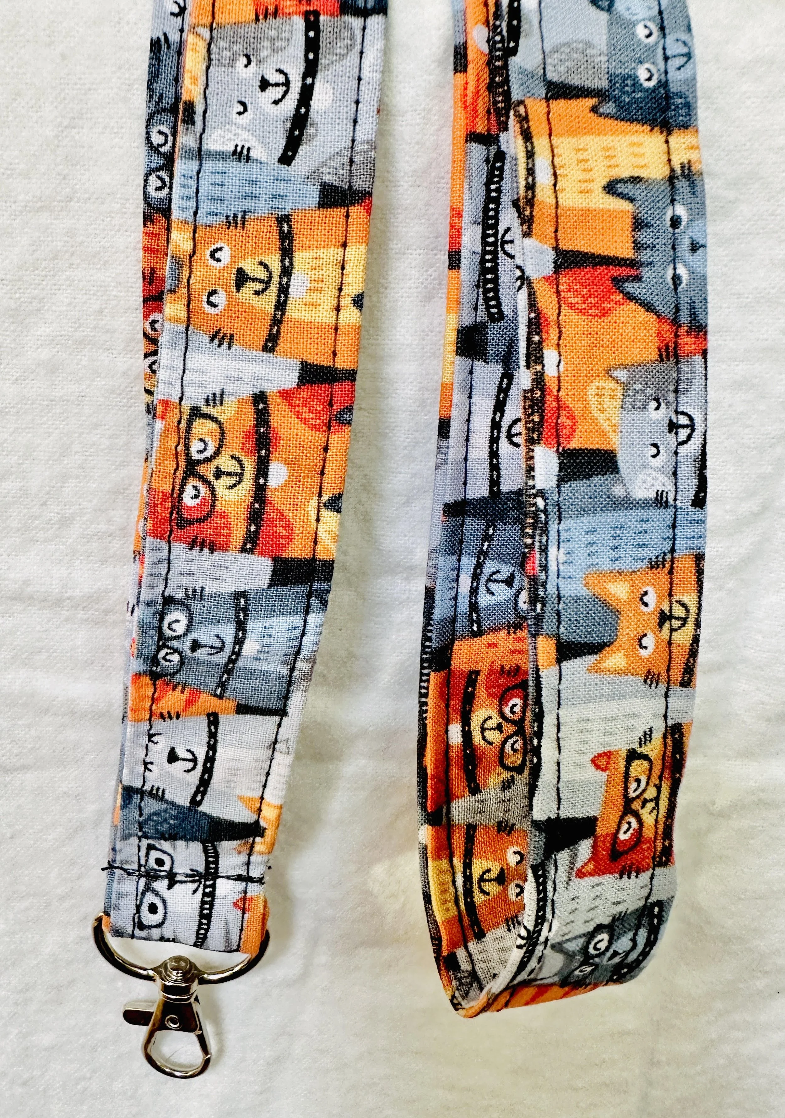 cats in glasses lanyard (1).jpg