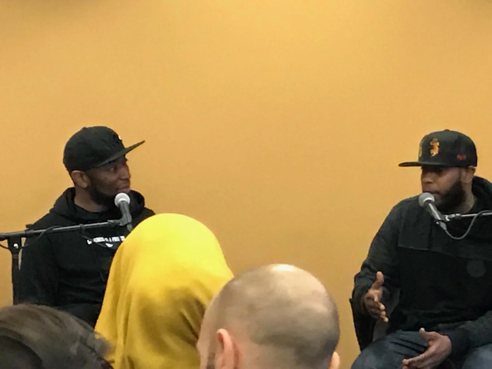  (Left to Right) 9th Wonder and Talib Kweli discussing his Rawkus Records. 
